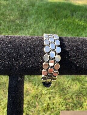Silver Tone Metal Disc Bracelet With Toggle Clasp